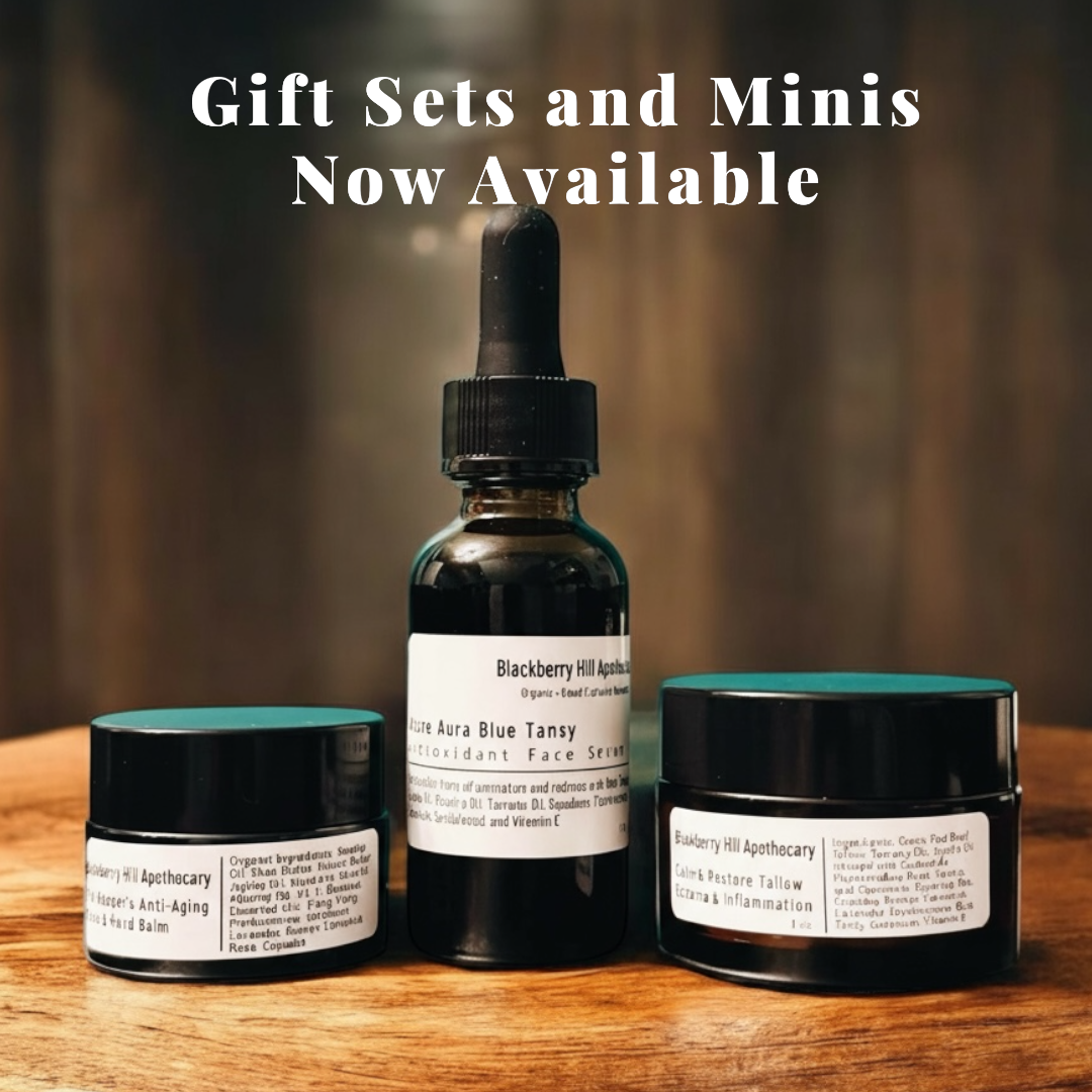 Three skincare products on a wooden surface with text 'Gift Sets and Minis Now Available'.