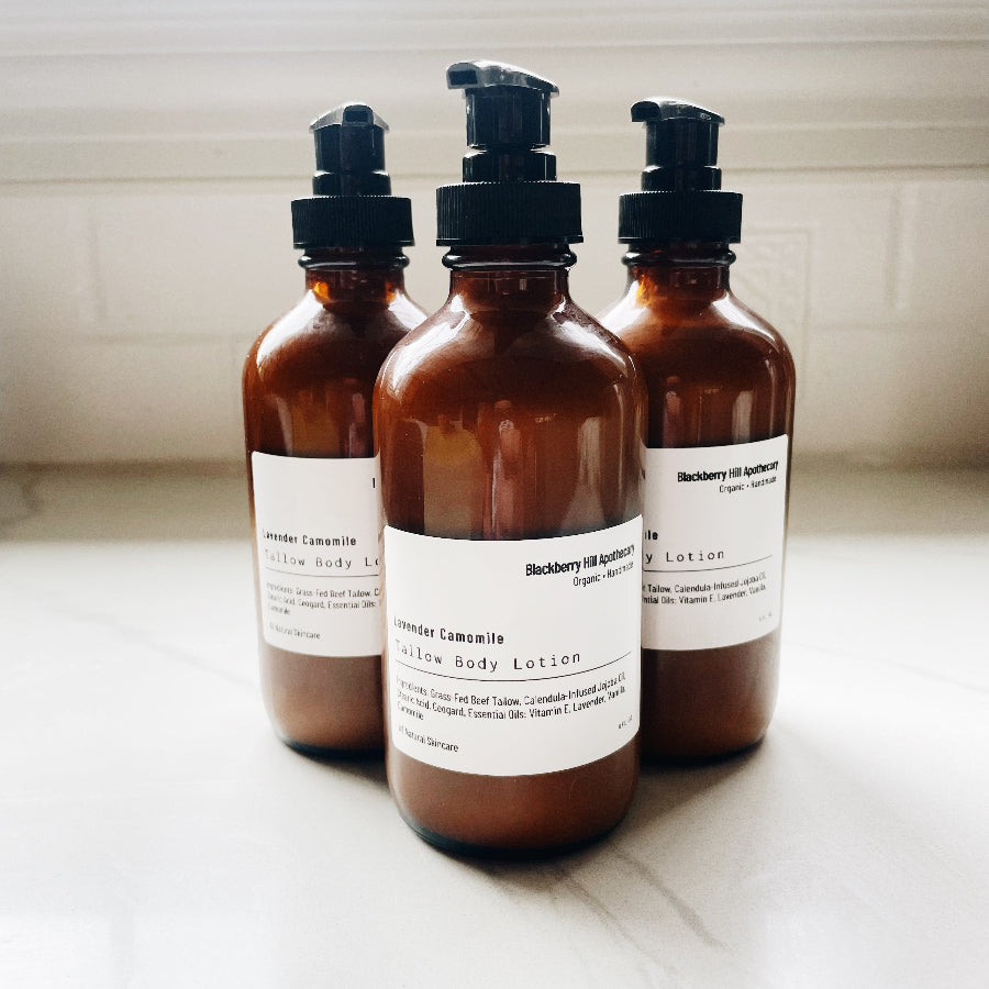 Tallow body lotion in 3 amber pump top glass bottles